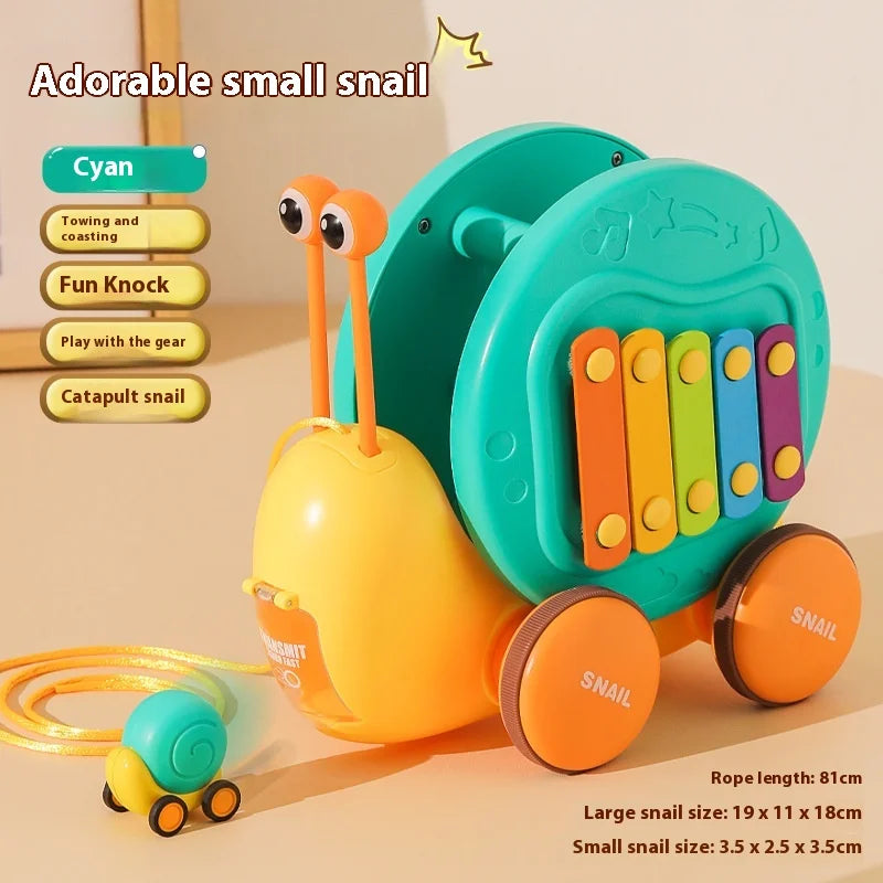 Juguete de cuerda deslizante para niños con forma de caracol para aprender a caminar, carro juguete de remolque