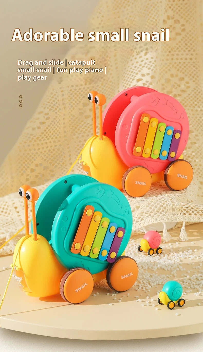 Juguete de cuerda deslizante para niños con forma de caracol para aprender a caminar, carro juguete de remolque