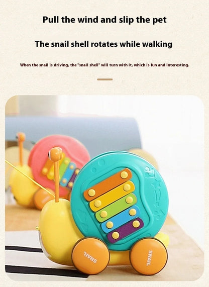 Juguete de cuerda deslizante para niños con forma de caracol para aprender a caminar, carro juguete de remolque