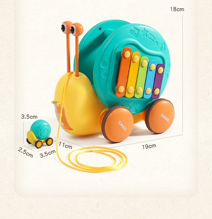 Juguete de cuerda deslizante para niños con forma de caracol para aprender a caminar, carro juguete de remolque