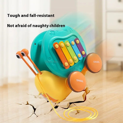Juguete de cuerda deslizante para niños con forma de caracol para aprender a caminar, carro juguete de remolque