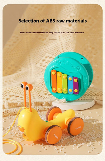 Juguete de cuerda deslizante para niños con forma de caracol para aprender a caminar, carro juguete de remolque