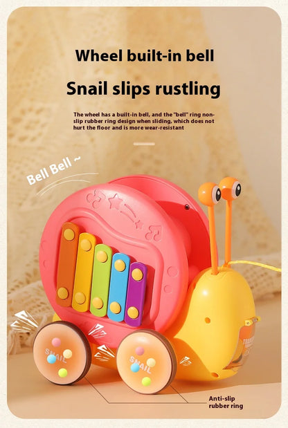 Juguete de cuerda deslizante para niños con forma de caracol para aprender a caminar, carro juguete de remolque
