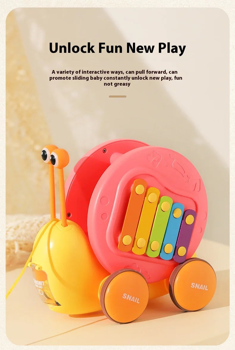 Juguete de cuerda deslizante para niños con forma de caracol para aprender a caminar, carro juguete de remolque